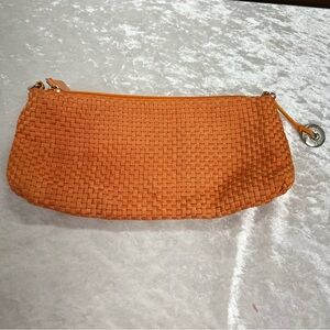 The SAK Purse Women’s orange Braided Clutch/shoulder bag missing strap